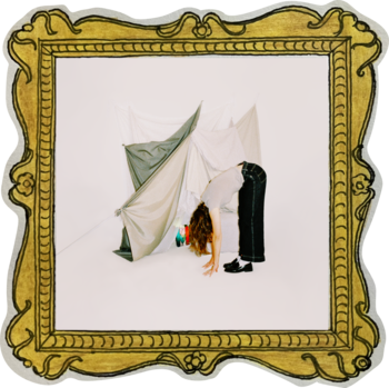 The album artwork for Lea Willms' debut album 'Marbles'. The album artwork shows Lea from the side, standing straight-legged, bending over to touch her toes. Behind her is a blanket fort. The scene is set against a blank white background.